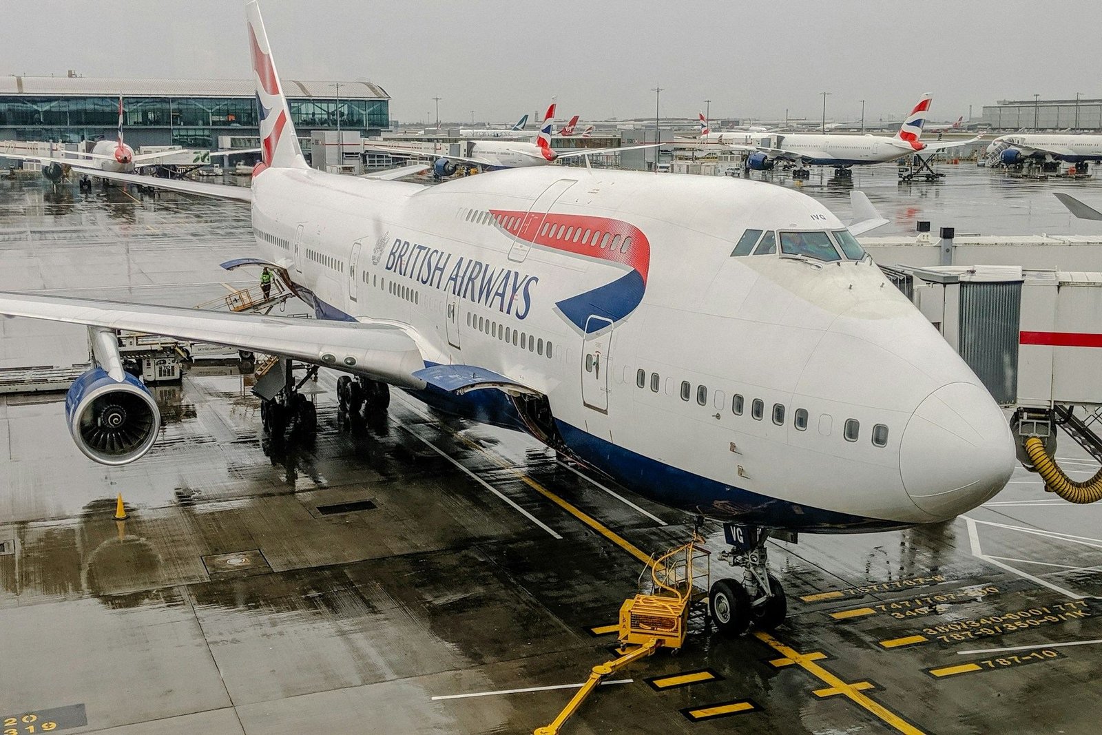 British Airways Boeing 747 at a gate at Heathrow on a wet day