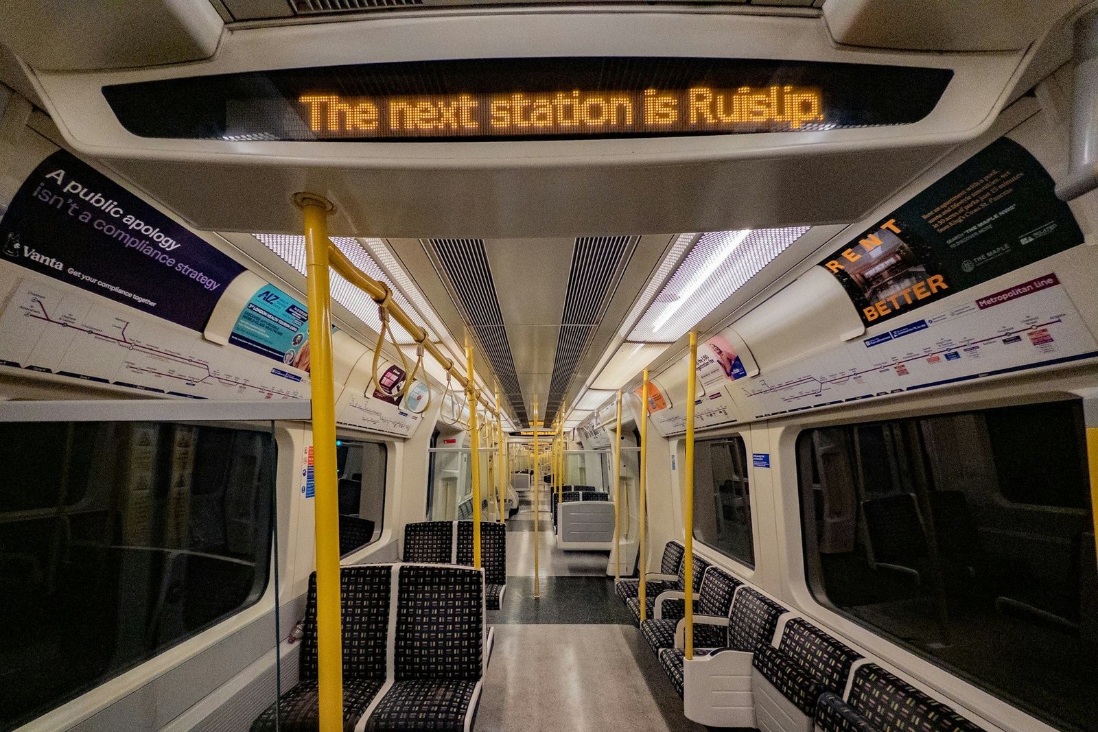 Inside a London Underground train with the next station shown as Ruislip