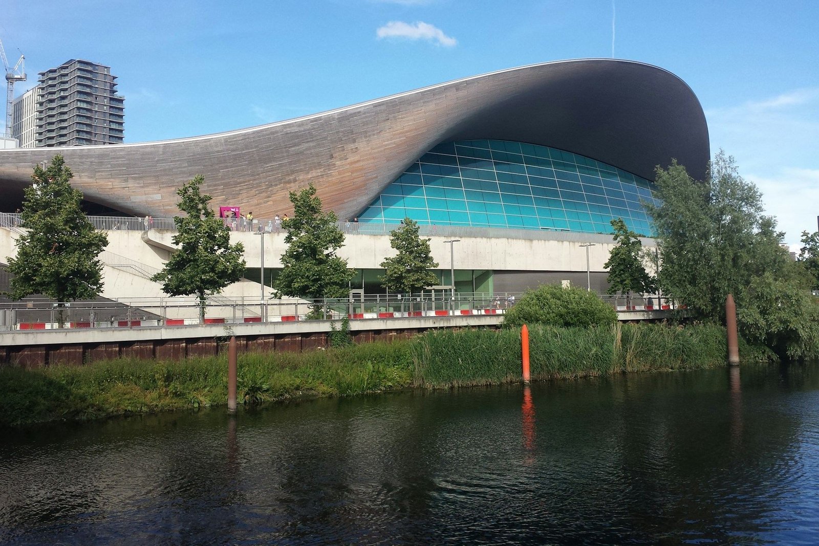 London Aquatics Centre at the Olympic Park beside the river