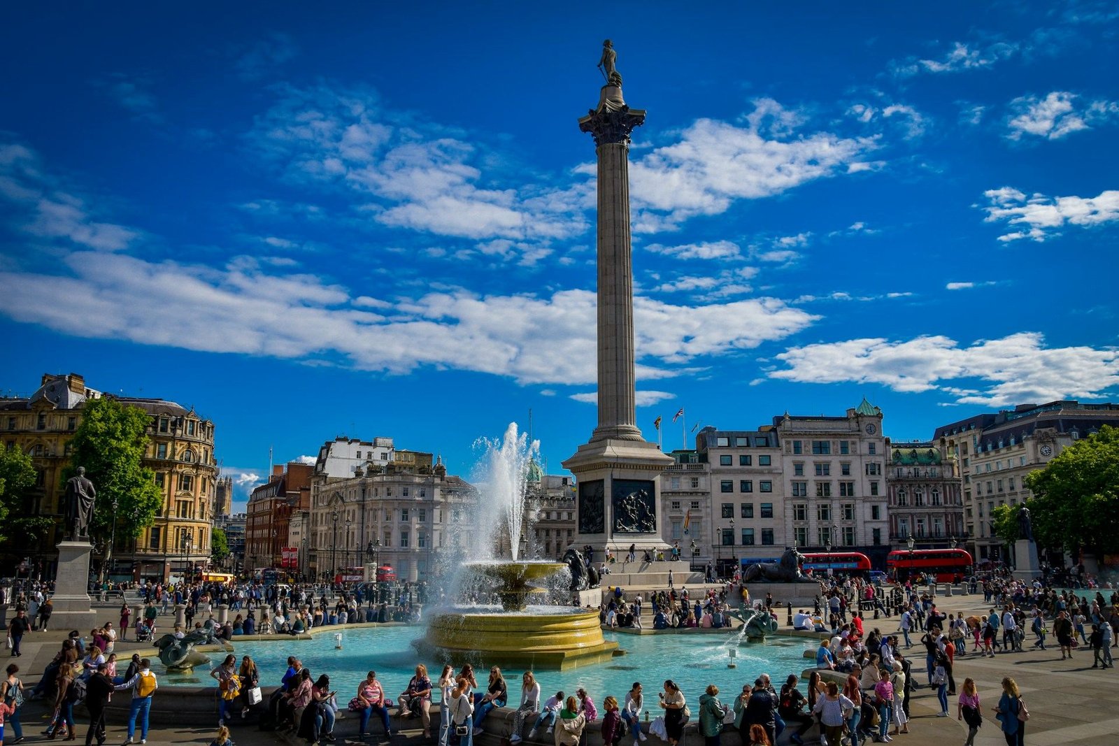 Nelson’s Column and fountains in a busy Trafalgar Square