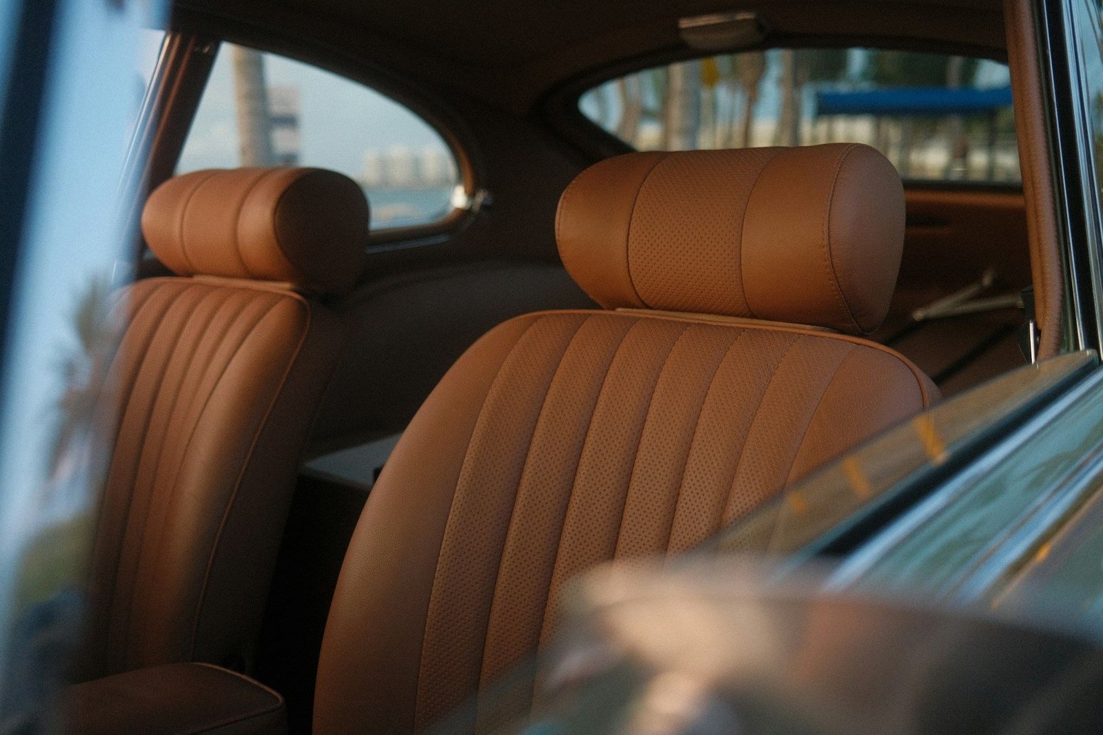 Tan leather car seats in soft daylight