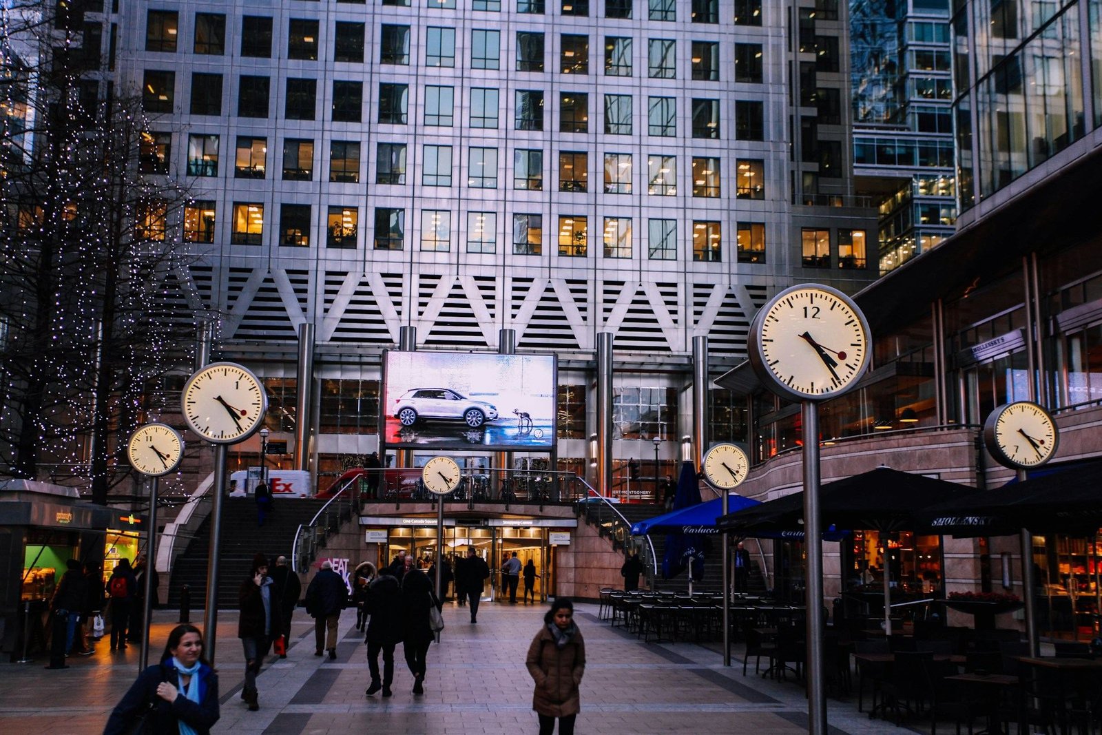 Clocks and office buildings in Canary Wharf