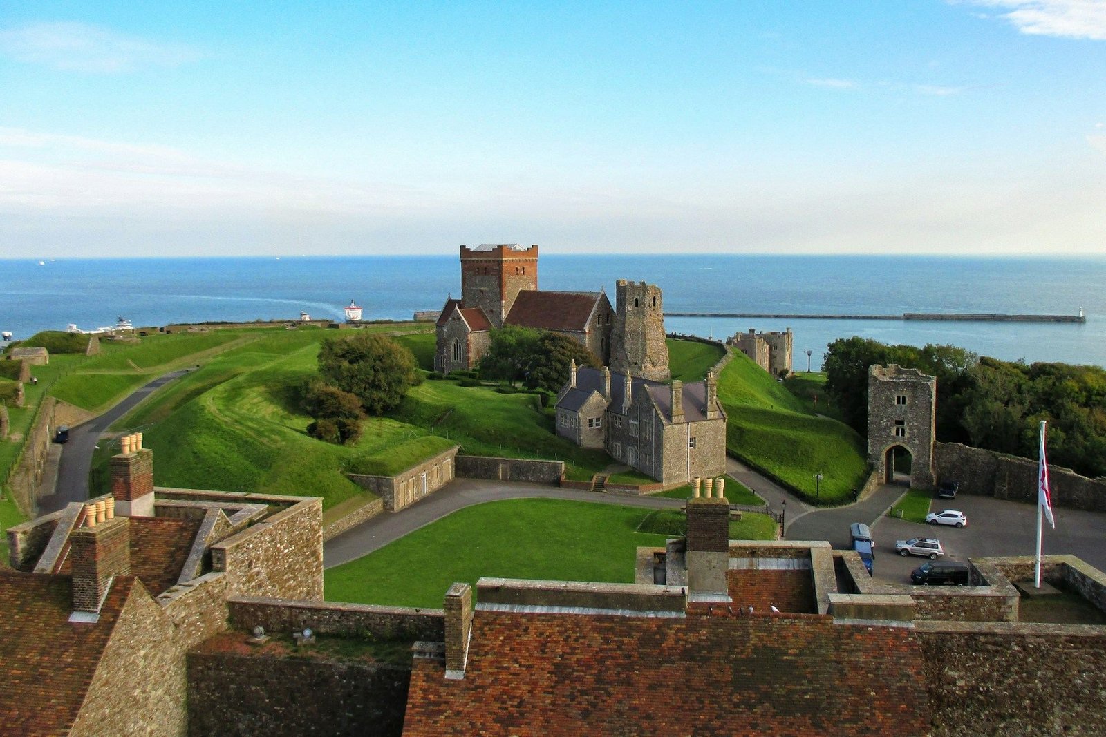 Dover Castle grounds with the harbour and sea beyond