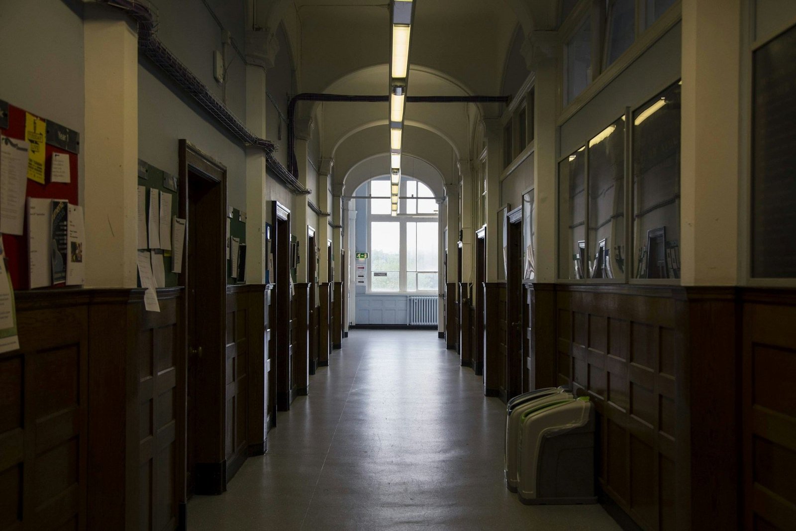Long corridor with wooden panelling in a school building